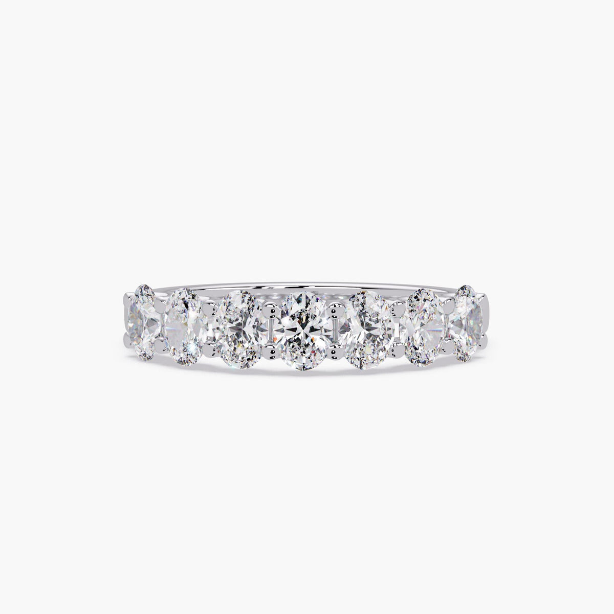 14K white gold oval lab grown diamond band featuring seven prong-set oval diamonds arranged across the top of the ring.