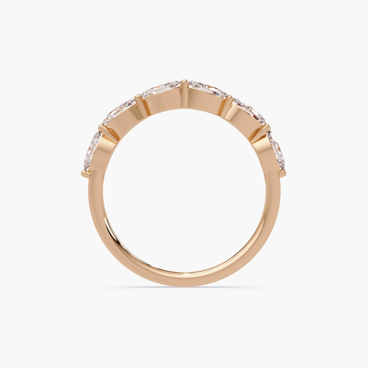 Marquise diamond band with a gentle curve, crafted in 14K rose gold with lab grown diamonds, minimalist wedding band enhancer style