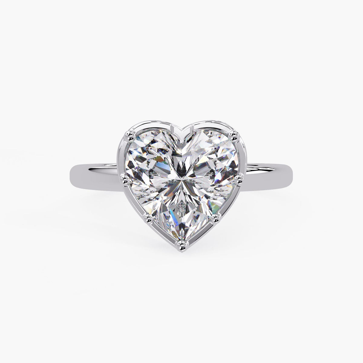 2.5 carat heart shaped lab grown diamond engagement ring on hand in 14k white gold