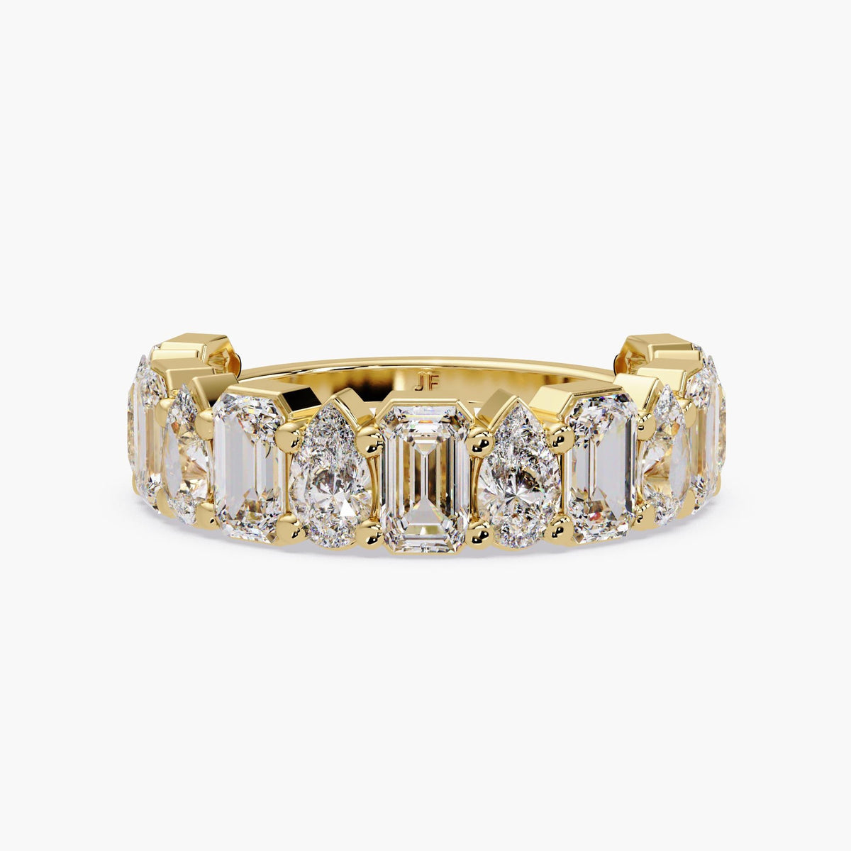 14K yellow gold eternity band featuring alternating emerald and pear cut lab grown diamonds set in a prong setting.