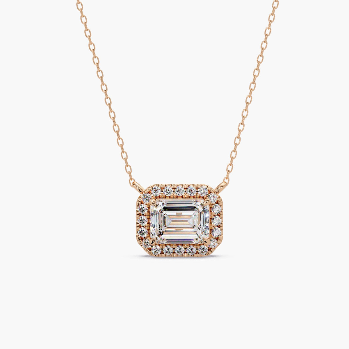Emerald cut lab diamond halo necklace in 14K rose gold with 1.75 CT IGI certified center stone and 1.95 CTW diamond pendant