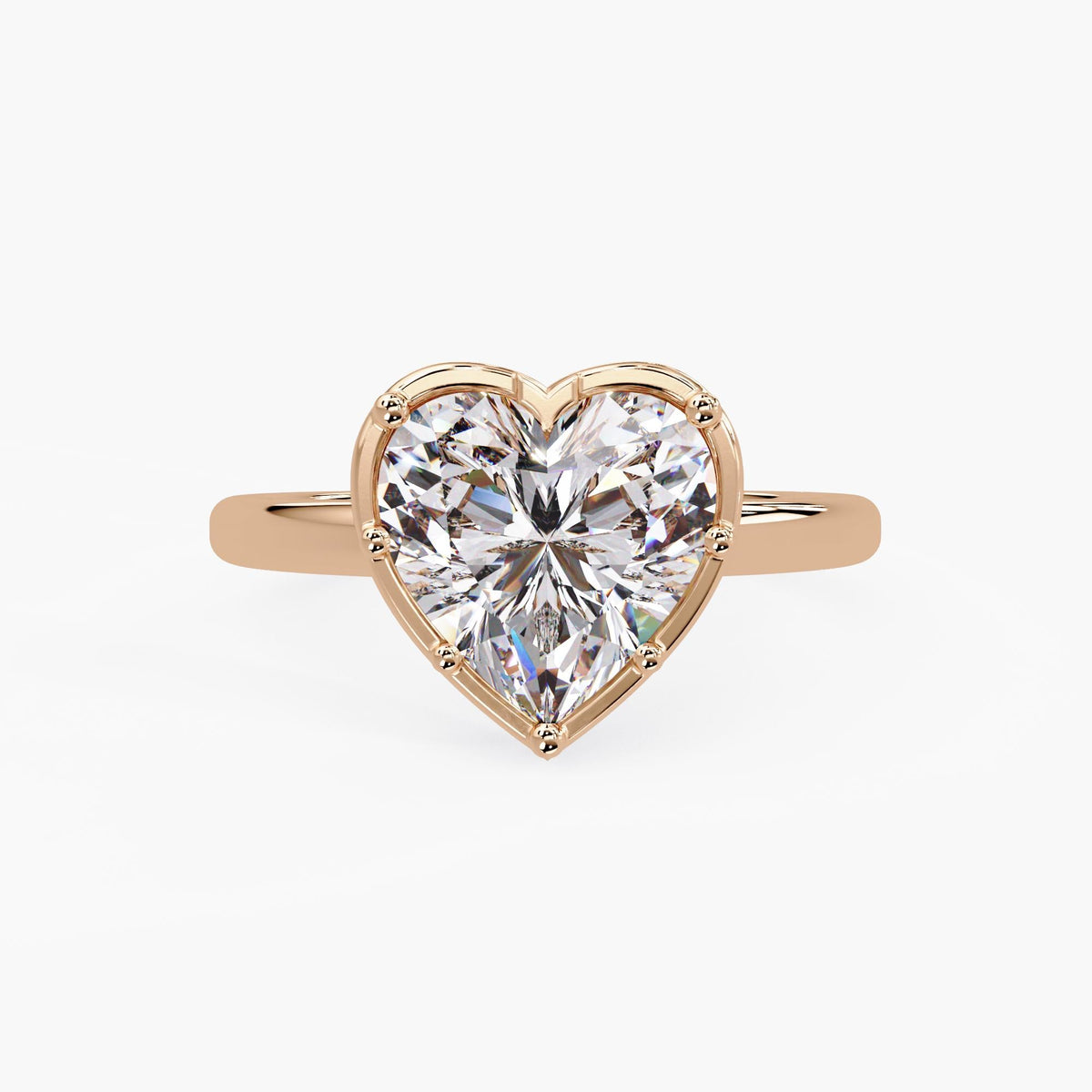 2.5 carat heart shaped lab grown diamond engagement ring on hand in 14k rose gold