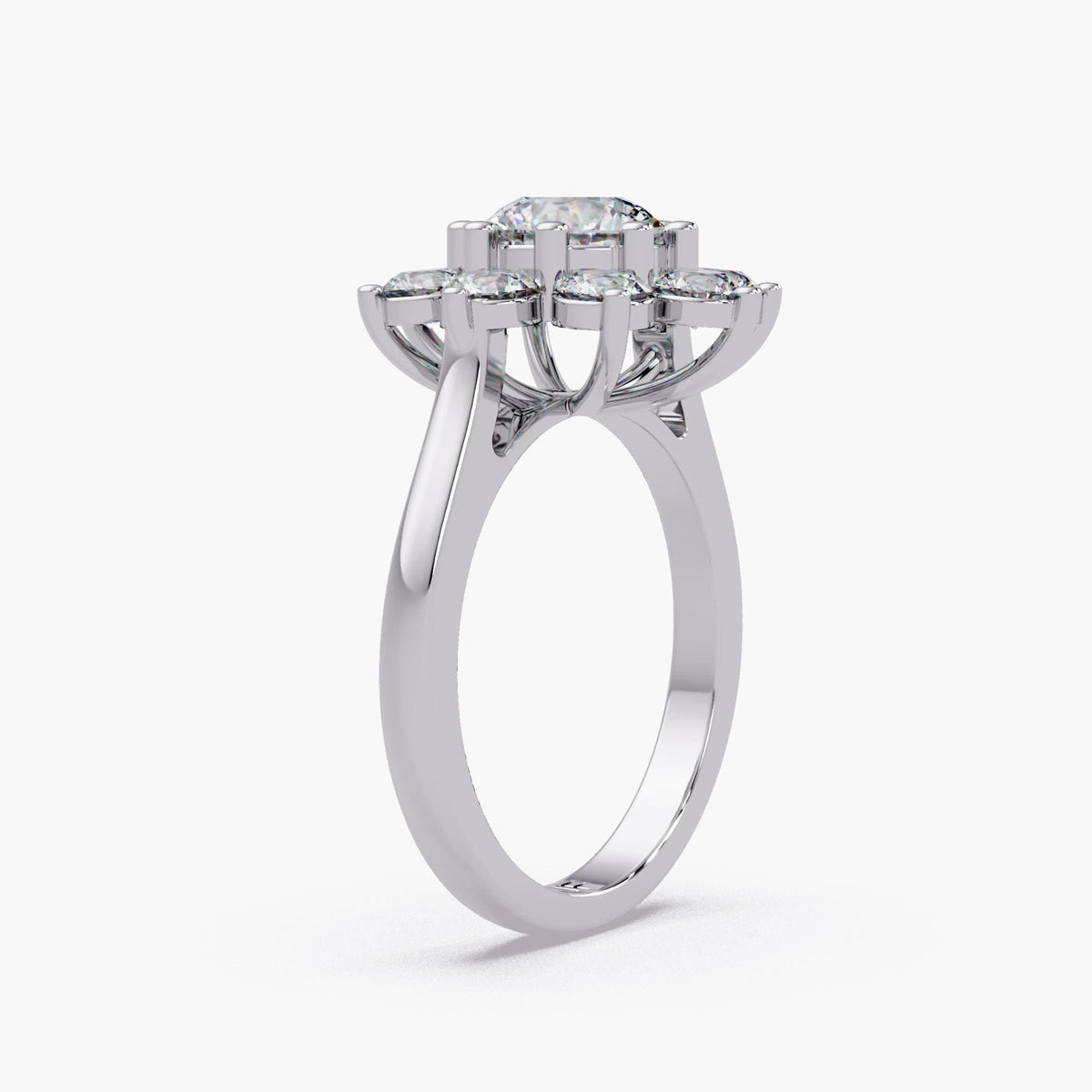 A side view of the white gold ring showing the height of the halo and the elegant taper of the band. The silver-toned setting enhances the icy-white brilliance of the IGI-certified center stone. This profile highlights the ring's regal stature, making it a standout choice for an anniversary gift.