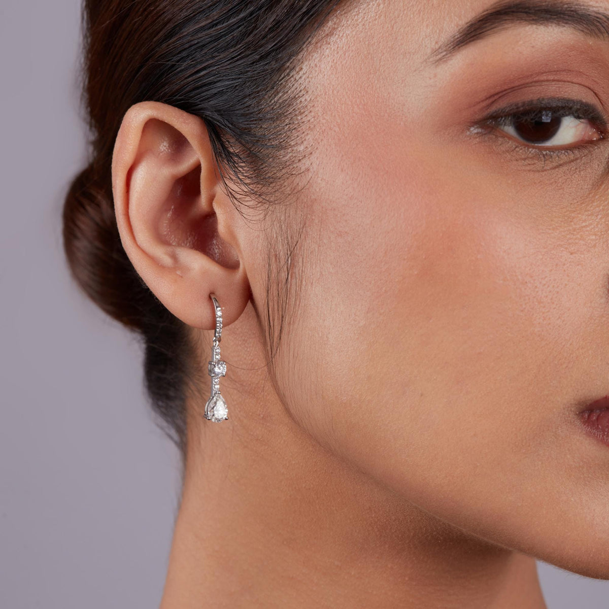 Pear diamond earrings showing 1.75 ctw lab grown diamonds in gold