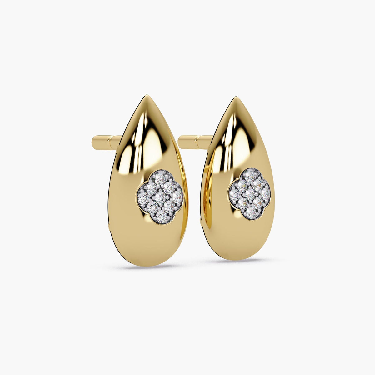 Teardrop dome earrings worn as bold gold stud earrings, water drop gold earrings with a modern silhouette designed as everyday statement studs in fine gold
