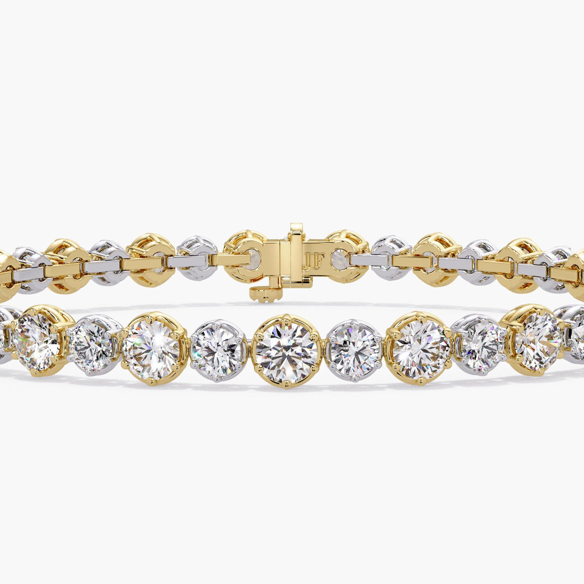 Alternating graduated diamond tennis bracelet in two tone 14K yellow and white gold with round lab grown diamonds