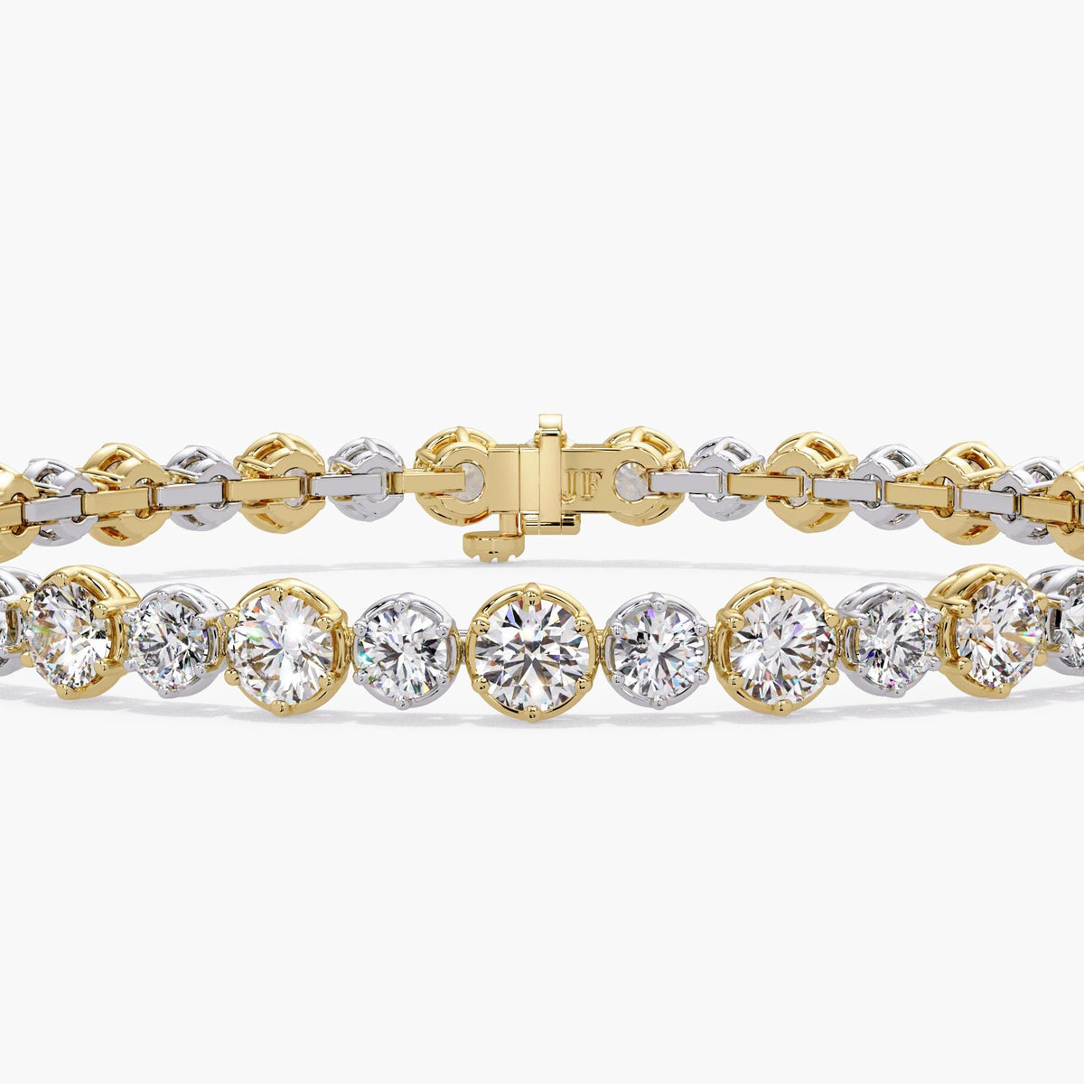 Alternating graduated diamond tennis bracelet in two tone 14K yellow and white gold with round lab grown diamonds