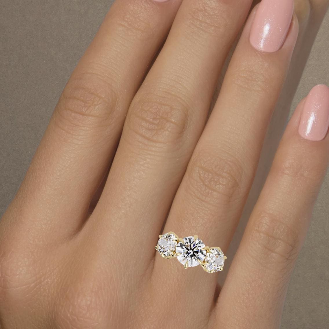 4ct round lab diamond engagement ring worn on hand