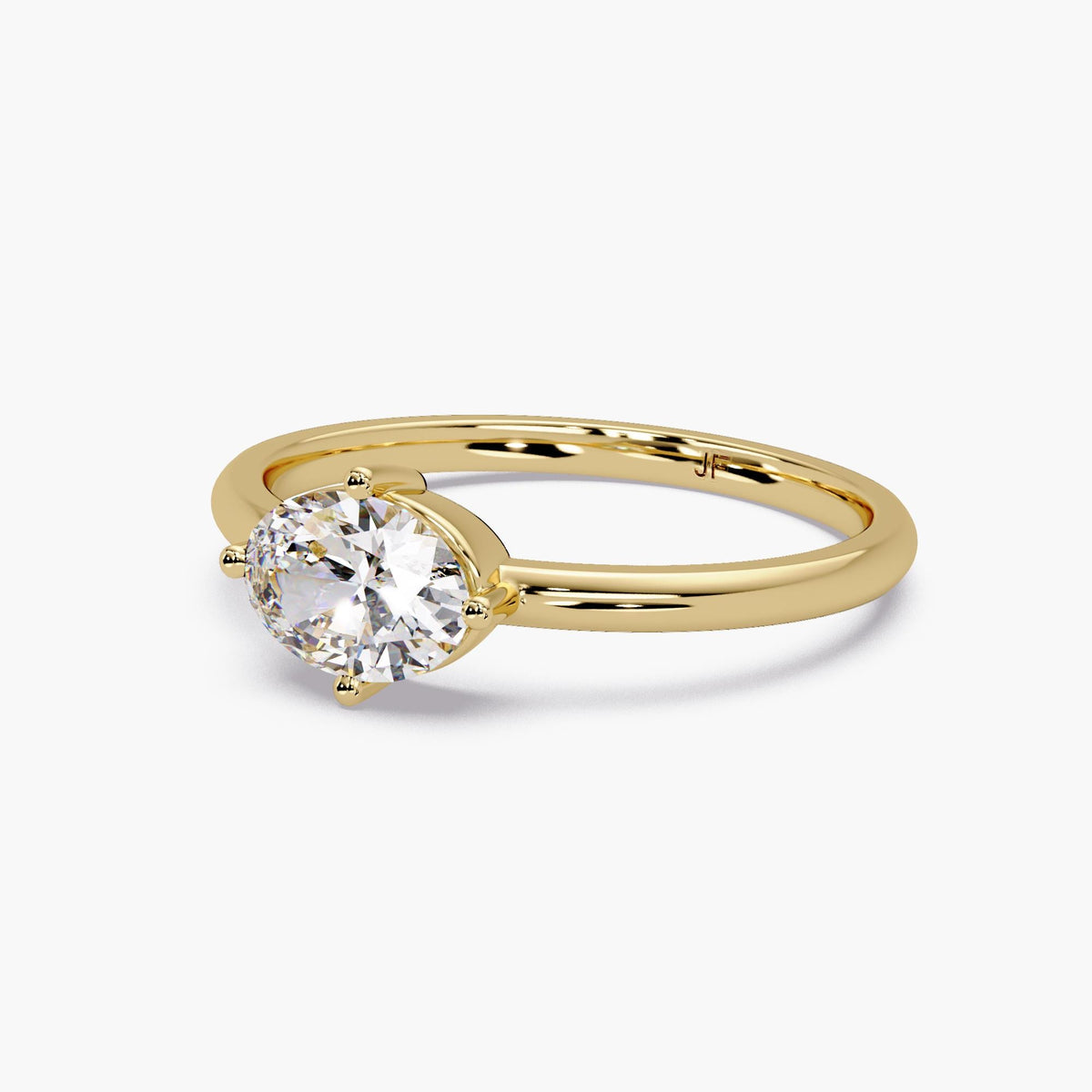 A side view focusing on the smooth, rounded shank and the delicate prong setting that securely elevates the diamond. This profile highlights the ring’s balanced proportions and clean lines, designed for those who appreciate minimalist elegance and effortless daily wear.