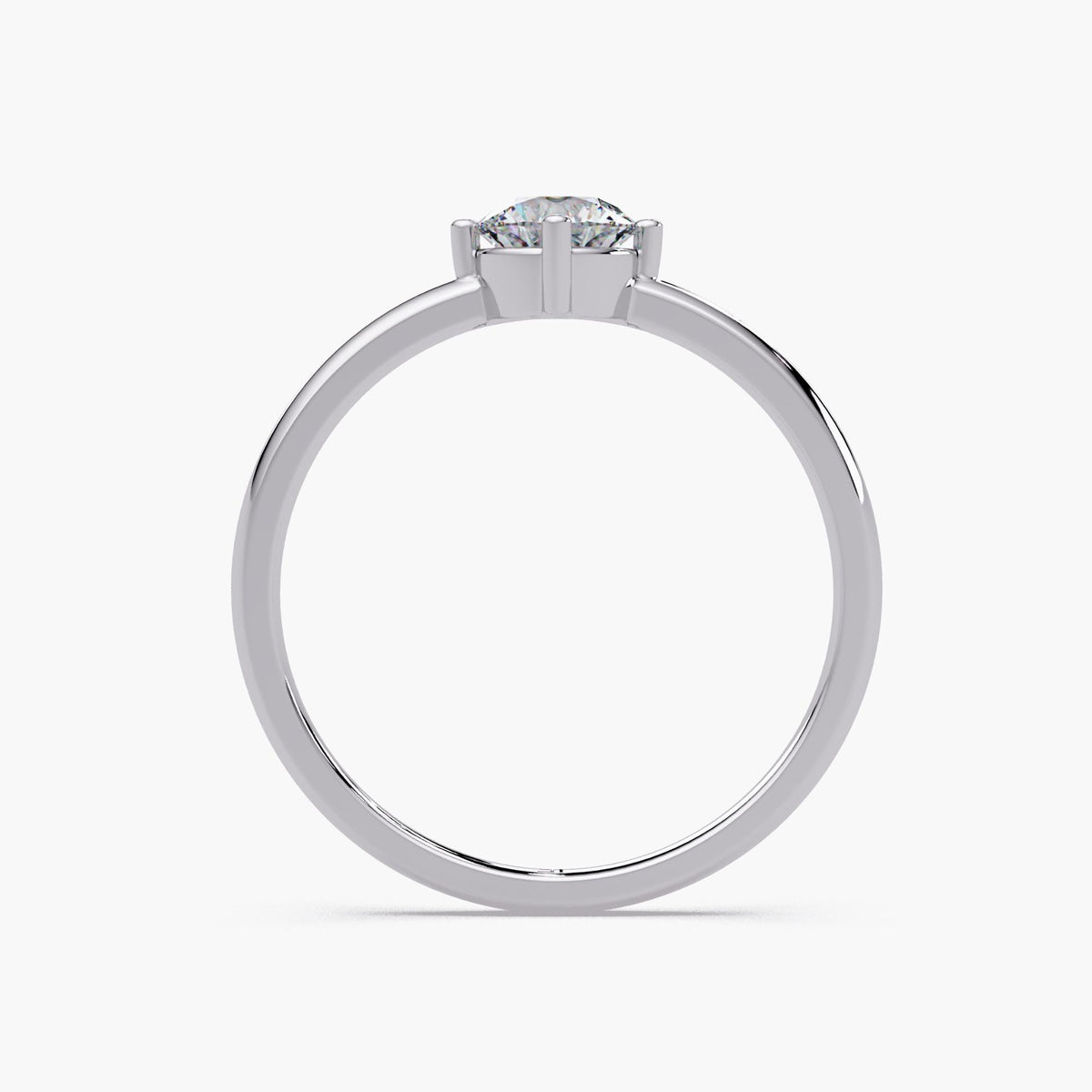 0.50 CT round lab grown diamond solitaire engagement ring in 14K white gold with four prong setting and thin 1.5mm band.
