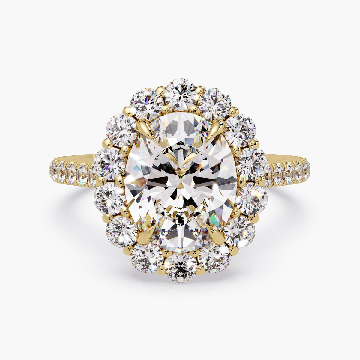 14K yellow gold oval halo engagement ring featuring a 2.5 carat IGI certified oval lab grown diamond center surrounded by round diamond halo and pavé band, total 3.5 ctw, cathedral setting