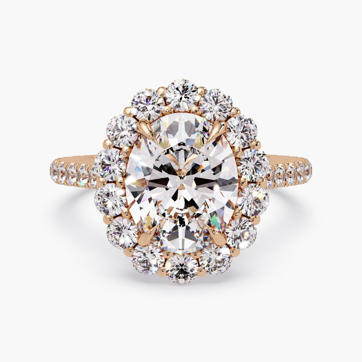 14K rose gold oval halo engagement ring featuring a 2.5 carat IGI certified oval lab grown diamond center with round diamond halo and pavé band, total 3.5 ctw cathedral setting
