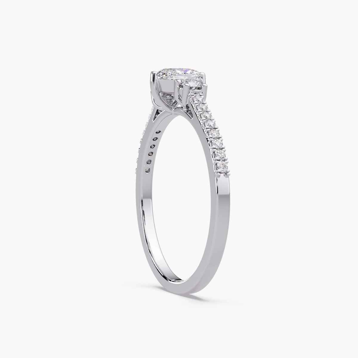 14K gold oval lab-grown diamond ring with three-stone design and pavé band.
A petite, low-profile diamond ring for promise, April birthstone, or meaningful gifting.
Clean, dainty diamond ring made for everyday wear