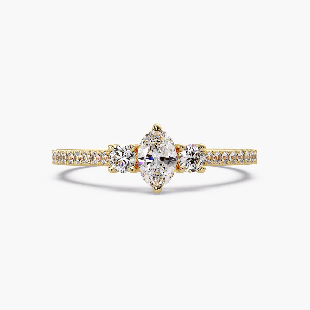 14K gold oval lab-grown diamond ring with three-stone design and pavé band.
A petite, low-profile diamond ring for promise, April birthstone, or meaningful gifting.
Clean, dainty diamond ring made for everyday wear