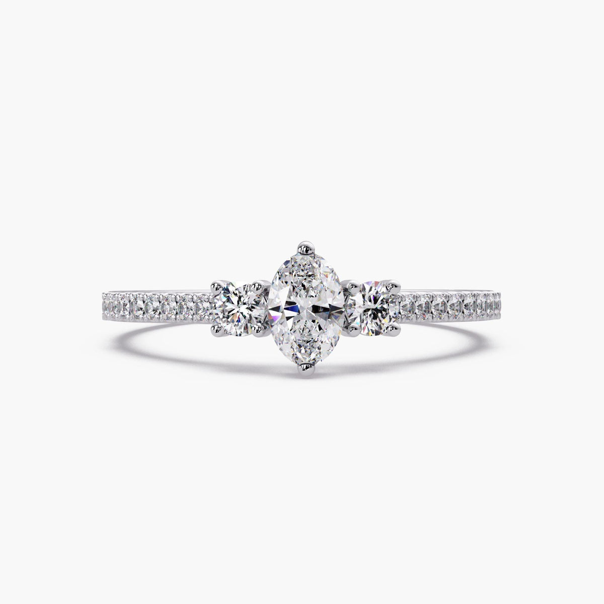 14K gold oval lab-grown diamond ring with three-stone design and pavé band.
A petite, low-profile diamond ring for promise, April birthstone, or meaningful gifting.
Clean, dainty diamond ring made for everyday wear