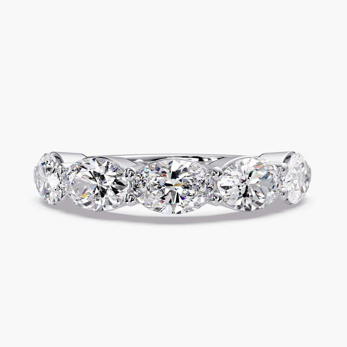 A showstopping east-west oval band, this 5-stone lab grown diamond ring features five 0.35 ct oval diamonds, creating an approximate 4mm diamond band across the finger.
This lab grown diamond anniversary band stacks effortlessly and makes a beautiful anniversary gift.