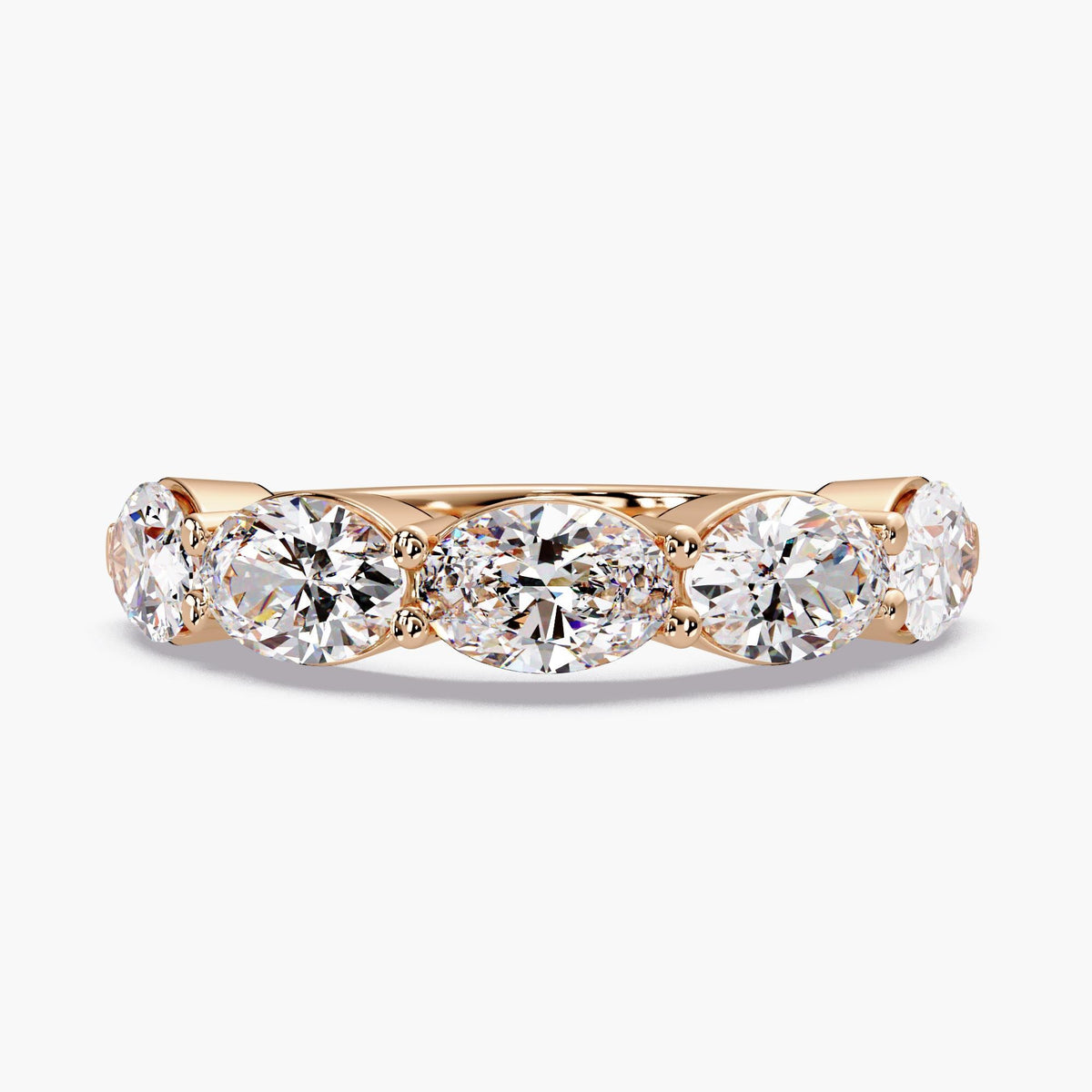 A showstopping east-west oval band, this 5-stone lab grown diamond ring features five 0.35 ct oval diamonds, creating an approximate 4mm diamond band across the finger.
This lab grown diamond anniversary band stacks effortlessly and makes a beautiful anniversary gift.