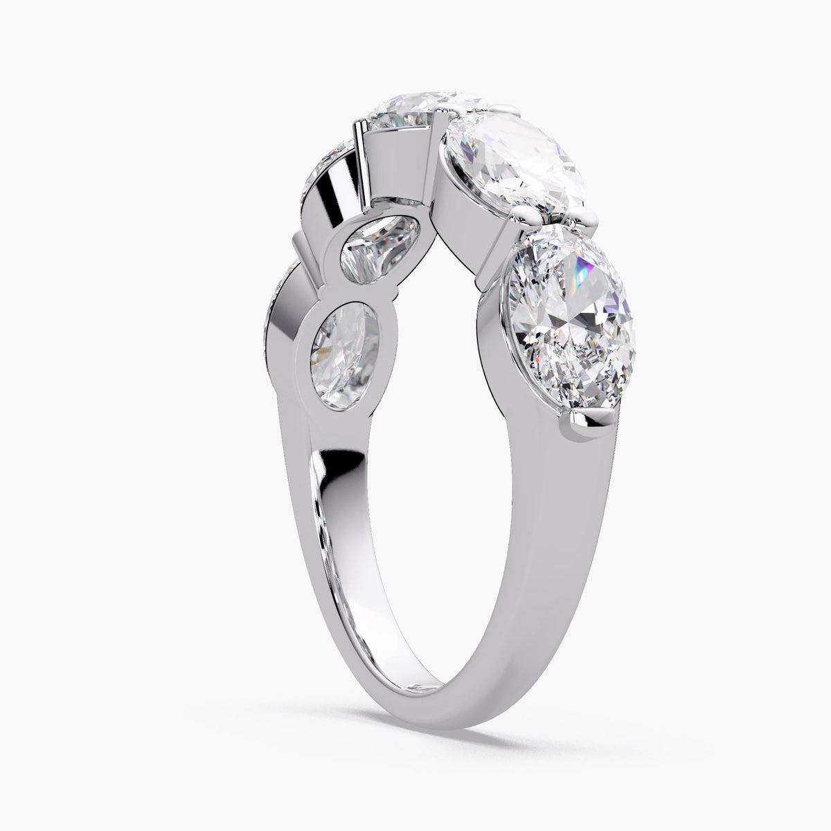 A showstopping east-west oval band, this 5-stone lab grown diamond ring features five 0.35 ct oval diamonds, creating an approximate 4mm diamond band across the finger.
This lab grown diamond anniversary band stacks effortlessly and makes a beautiful anniversary gift.