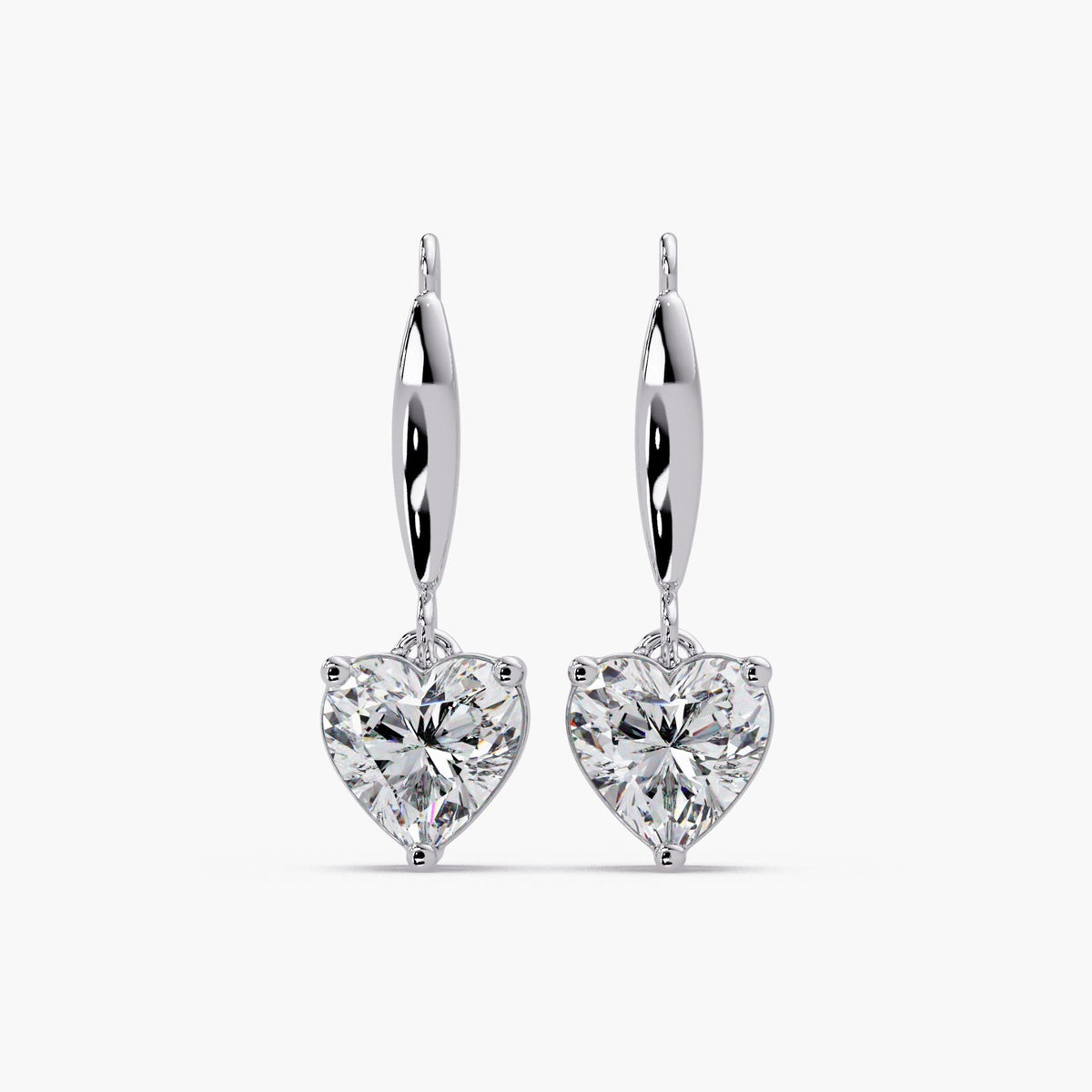 heart diamond earrings on ear 14k gold drop earrings everyday wear