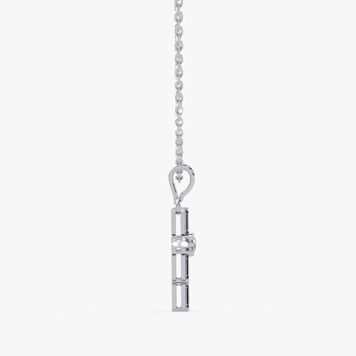 diamond cross pendant side view, single prong baguette setting cross, gold cross necklace detail