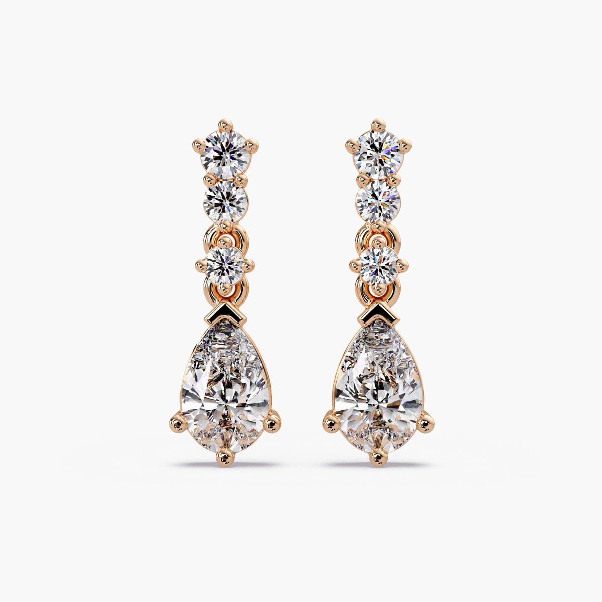 pear shaped diamond drop earrings / lab grown pear diamond earrings / statement diamond drop earrings / white gold diamond earrings / yellow gold diamond earrings / rose gold diamond earrings
