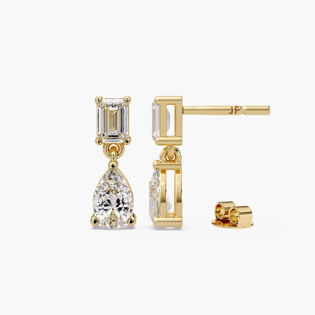 Lab grown diamond drop earrings featuring emerald cut studs and pear diamond dangle