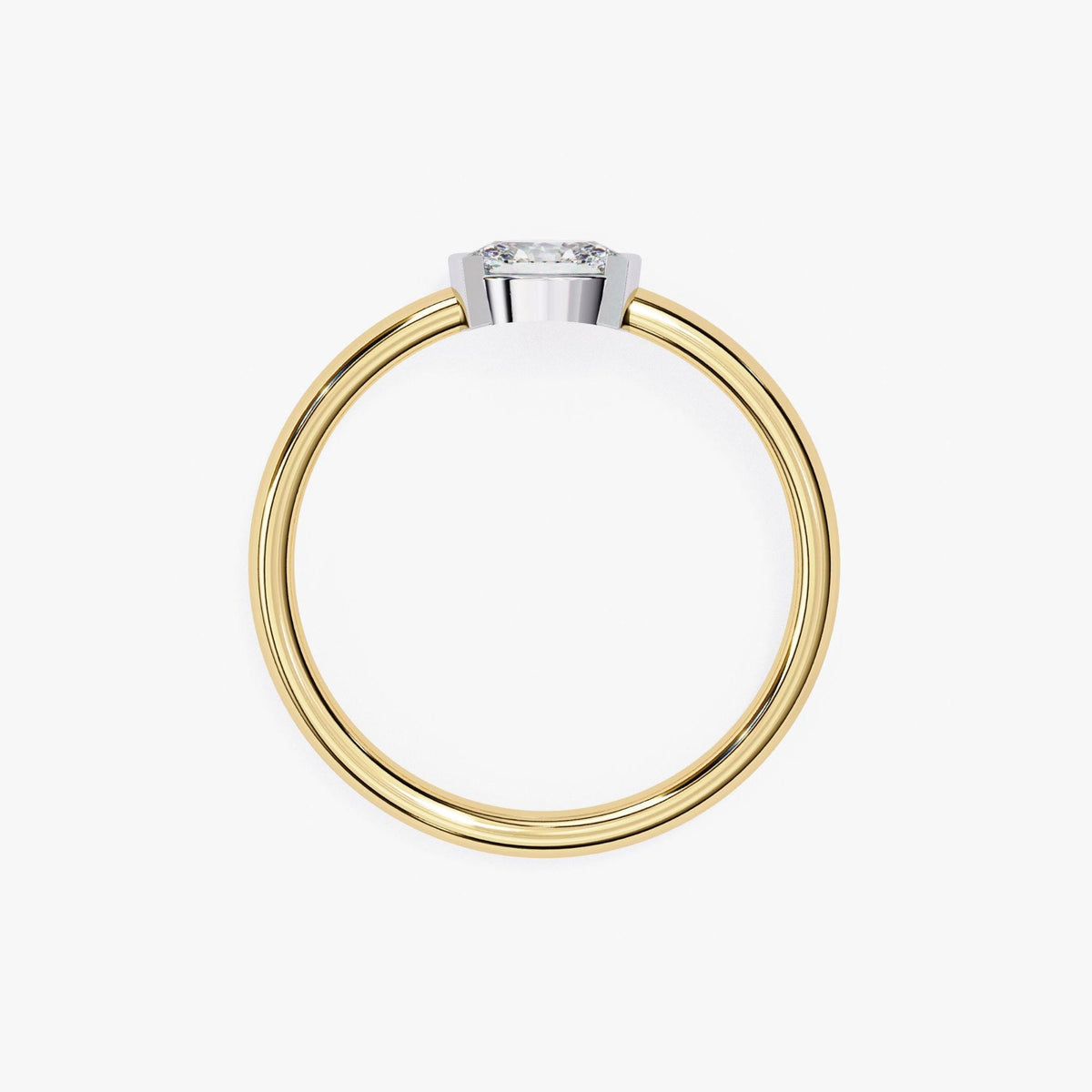 A gold ring with a diamond set in the center.