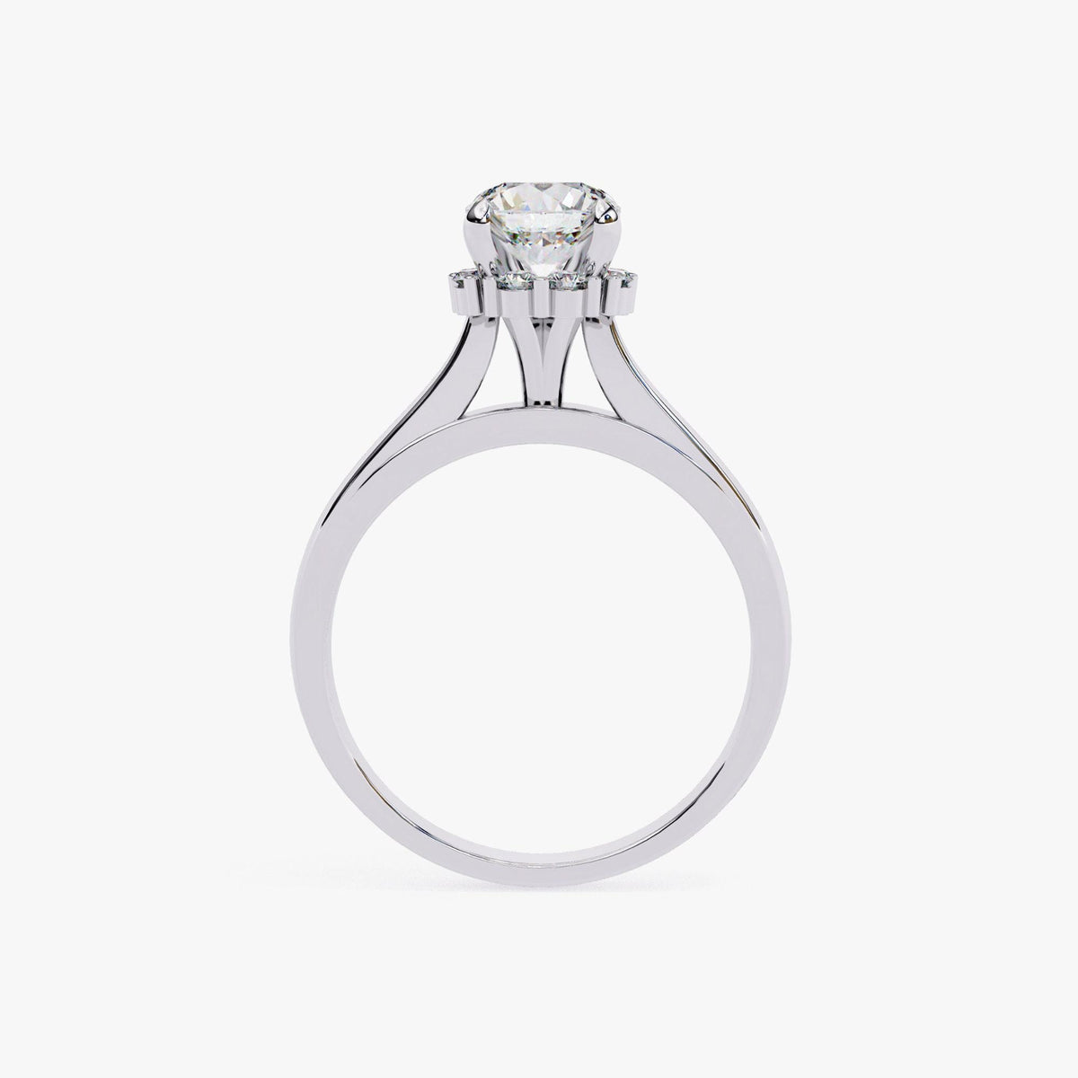 A silver engagement ring with a large diamond set in the center.