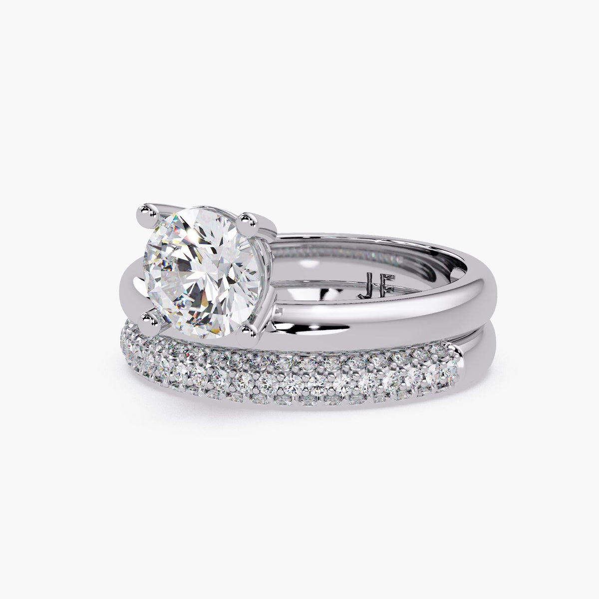 IGI certified lab diamond bridal set in white gold featuring round solitaire center stone