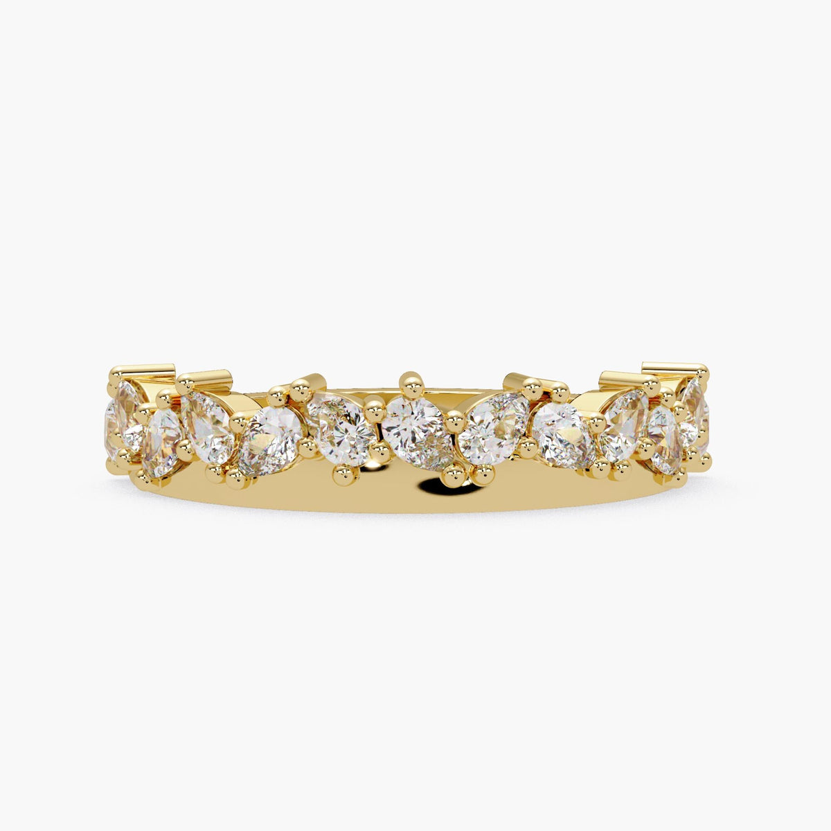 A gold ring with a row of small, clear diamonds set in the band.