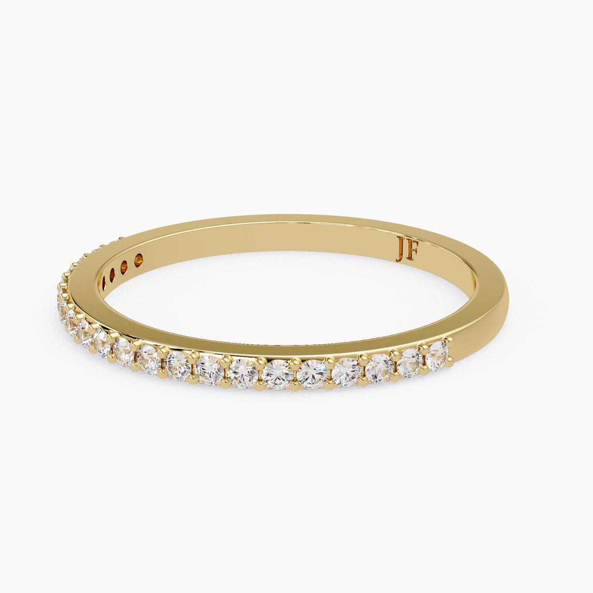 A gold band with a row of small diamonds set in it.