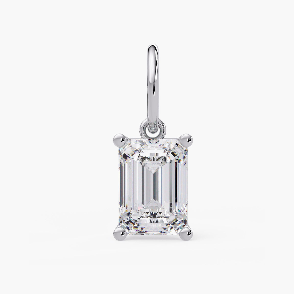 Emerald cut solitaire diamond pendant in solid 14K white gold