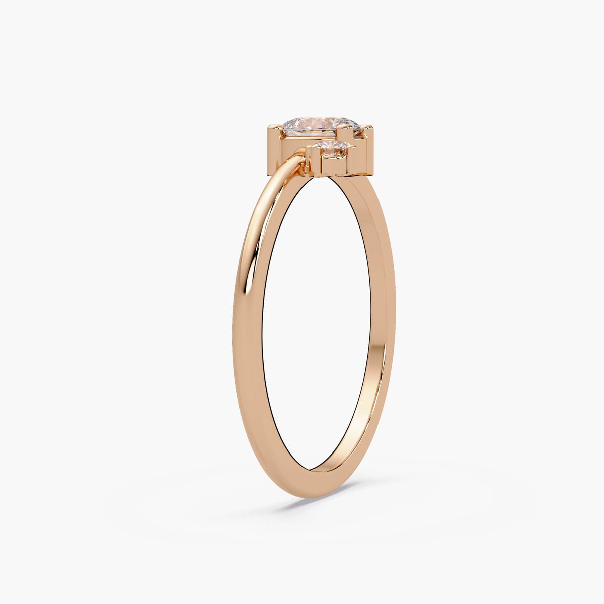 A gold ring with a large central gemstone, possibly a diamond, set in a solitaire style.