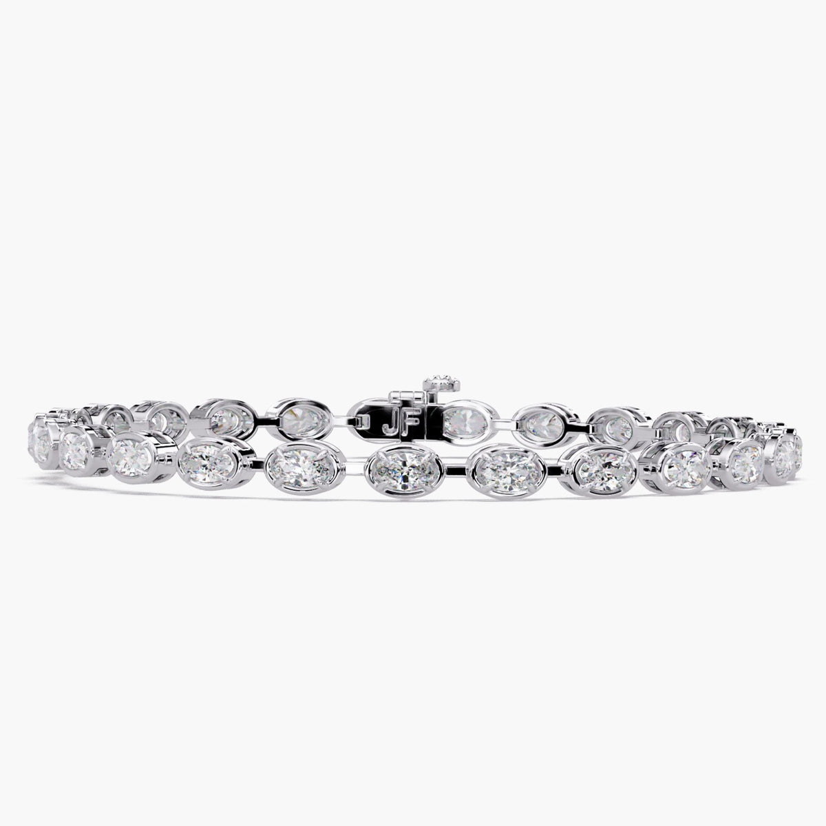White gold oval diamond tennis bracelet featuring VVS+ lab grown diamonds