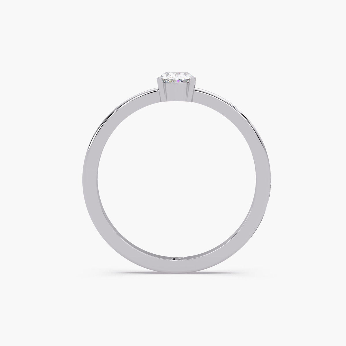 low-set oval lab diamond solitaire engagement ring with a thin band