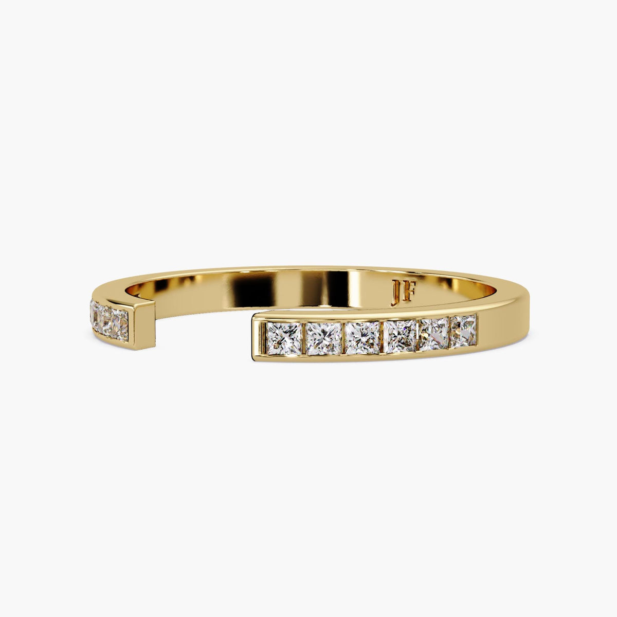 Polished yellow gold diamond cuff with a slim geometric open design.