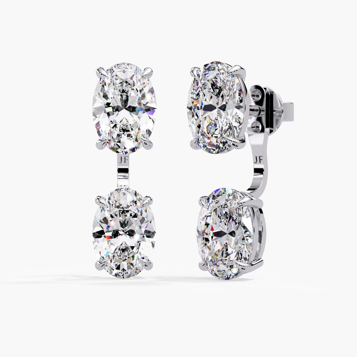 14K white gold diamond stud earring enhancers paired with oval solitaire studs to create a two-stone oval lab-grown diamond drop design.