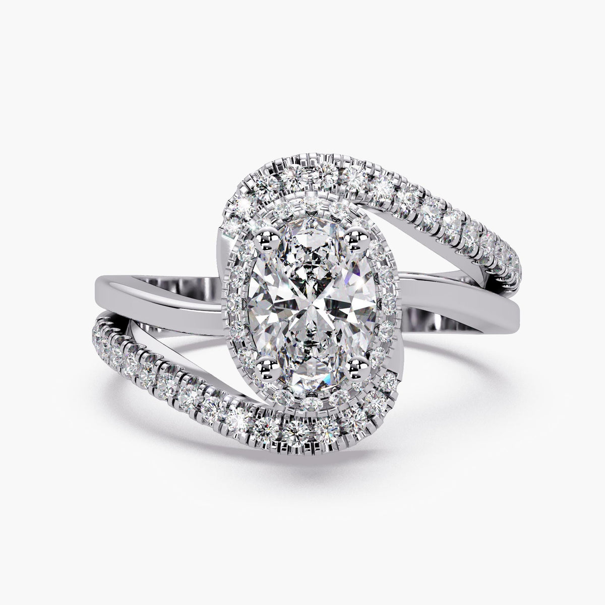 14K white gold oval lab-grown diamond engagement ring with an IGI-certified center, pavé halo and bypass band