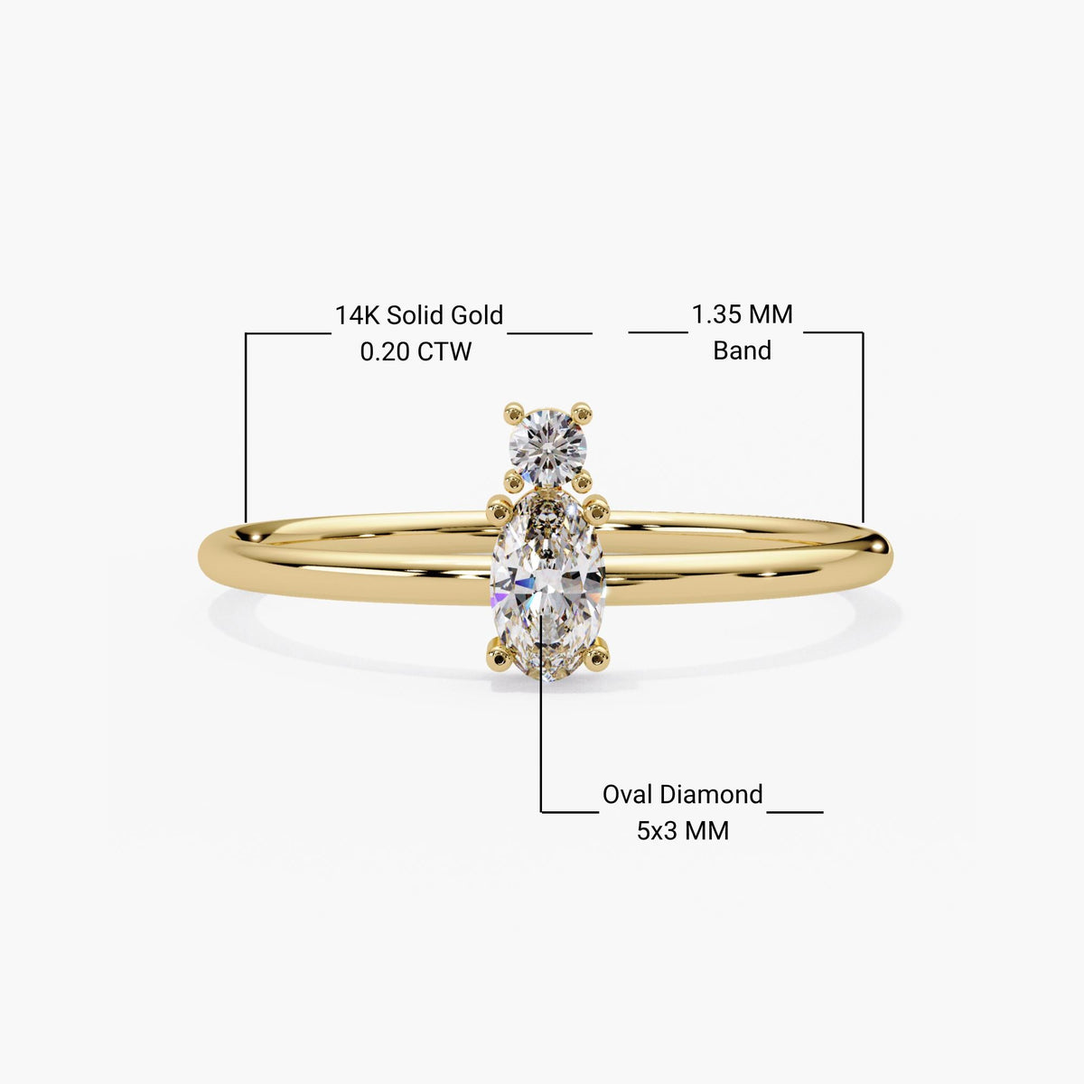 14k yellow gold two stone ring with an oval and round lab grown diamond, each prong set on a slim stacking band.