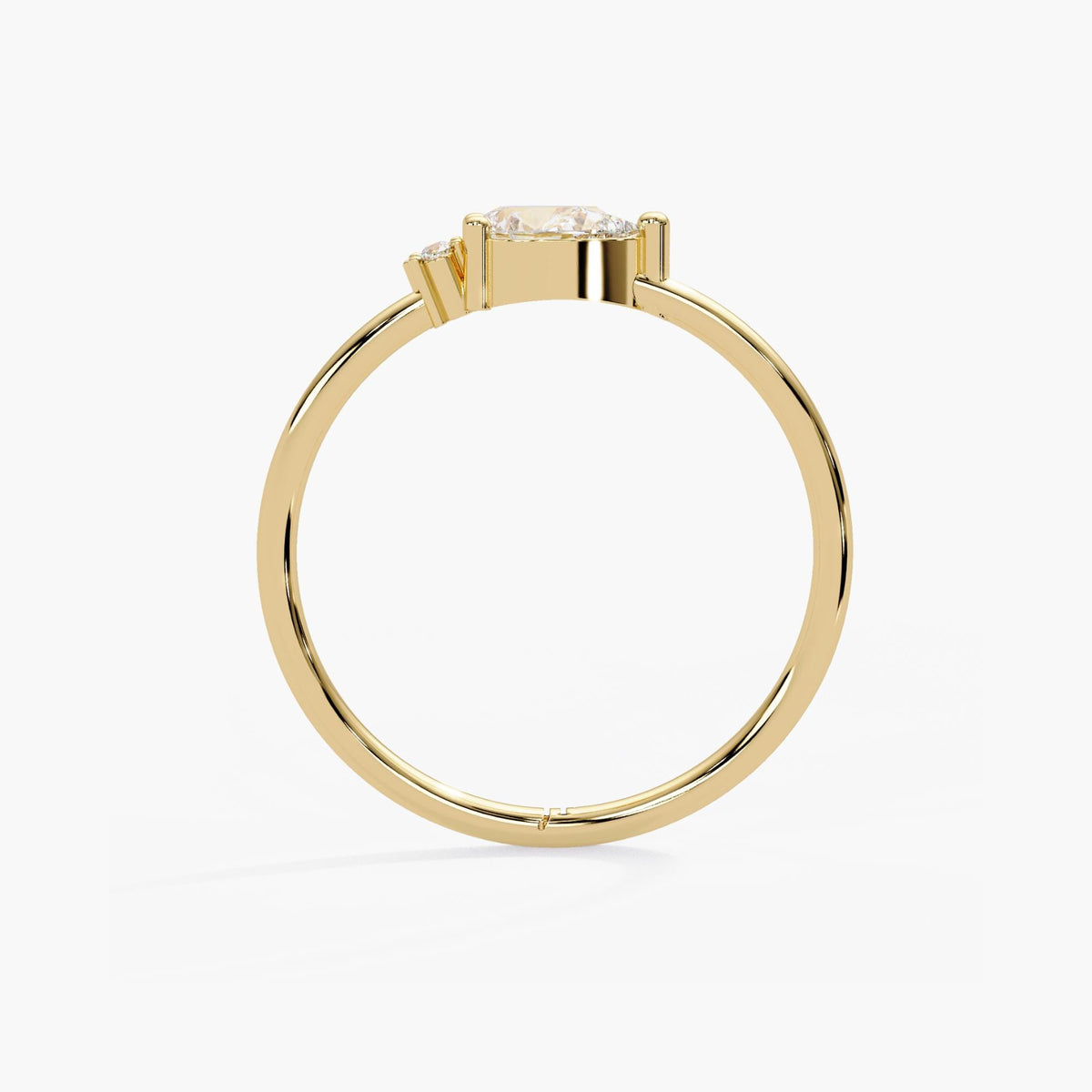 14k yellow gold pear diamond ring with a smooth round wire band in a comfortable dainty width.