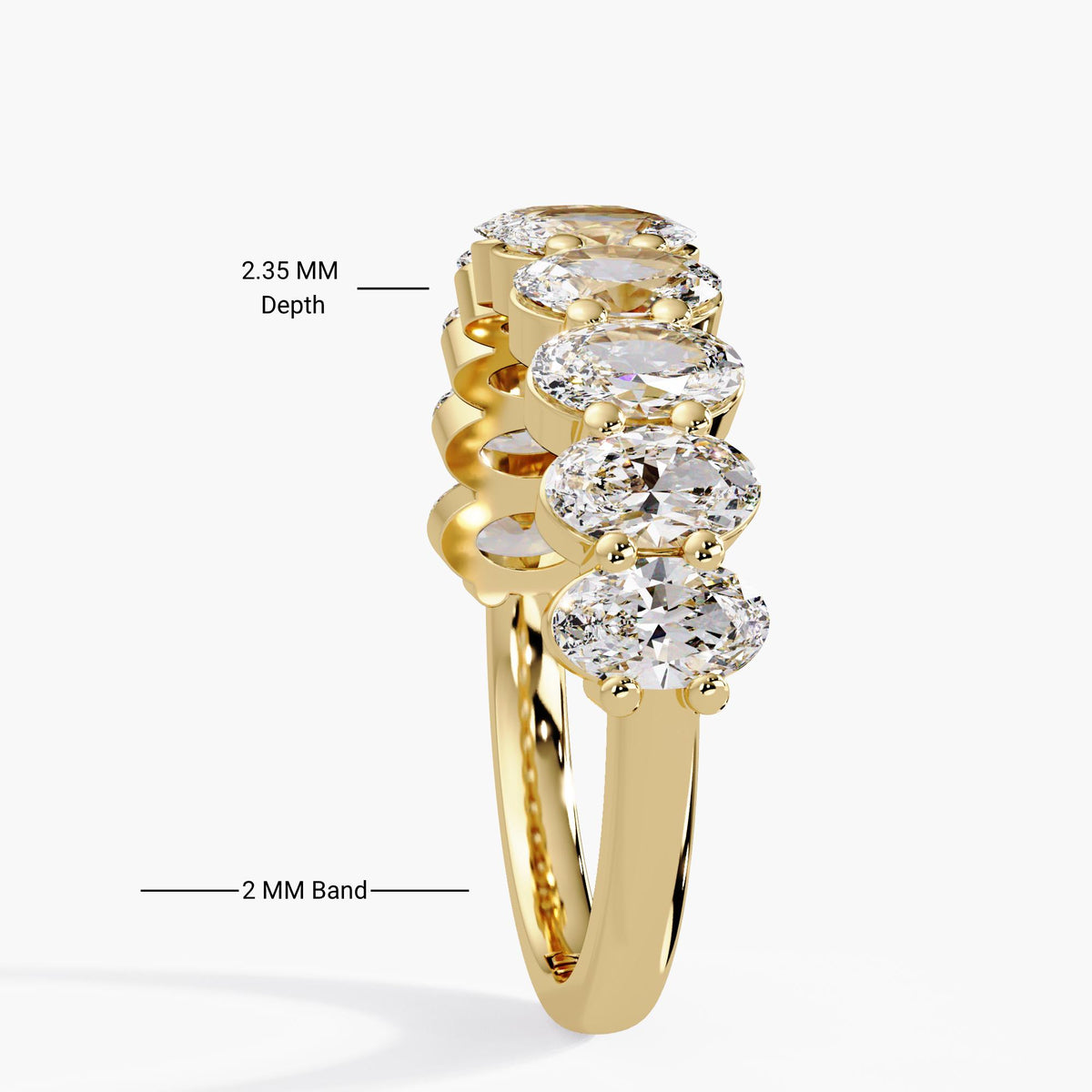 Low setting oval lab grown diamond wedding band in 14K yellow gold, with a shared prong design and ten oval diamonds