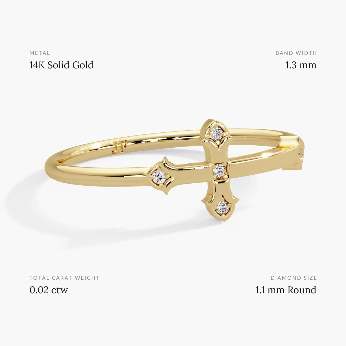 Minimalist 14K yellow gold sideways cross ring on a 1.3 mm band