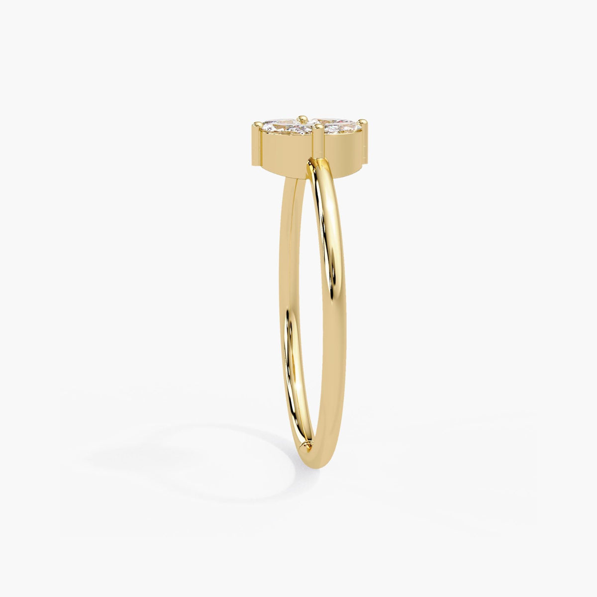 14K yellow gold diamond cluster ring with a raised floral setting, gold prongs and a smooth, narrow shank.
