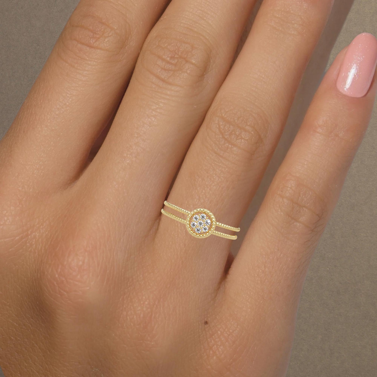 14K yellow gold beaded halo ring with seven 1.5 mm round diamonds