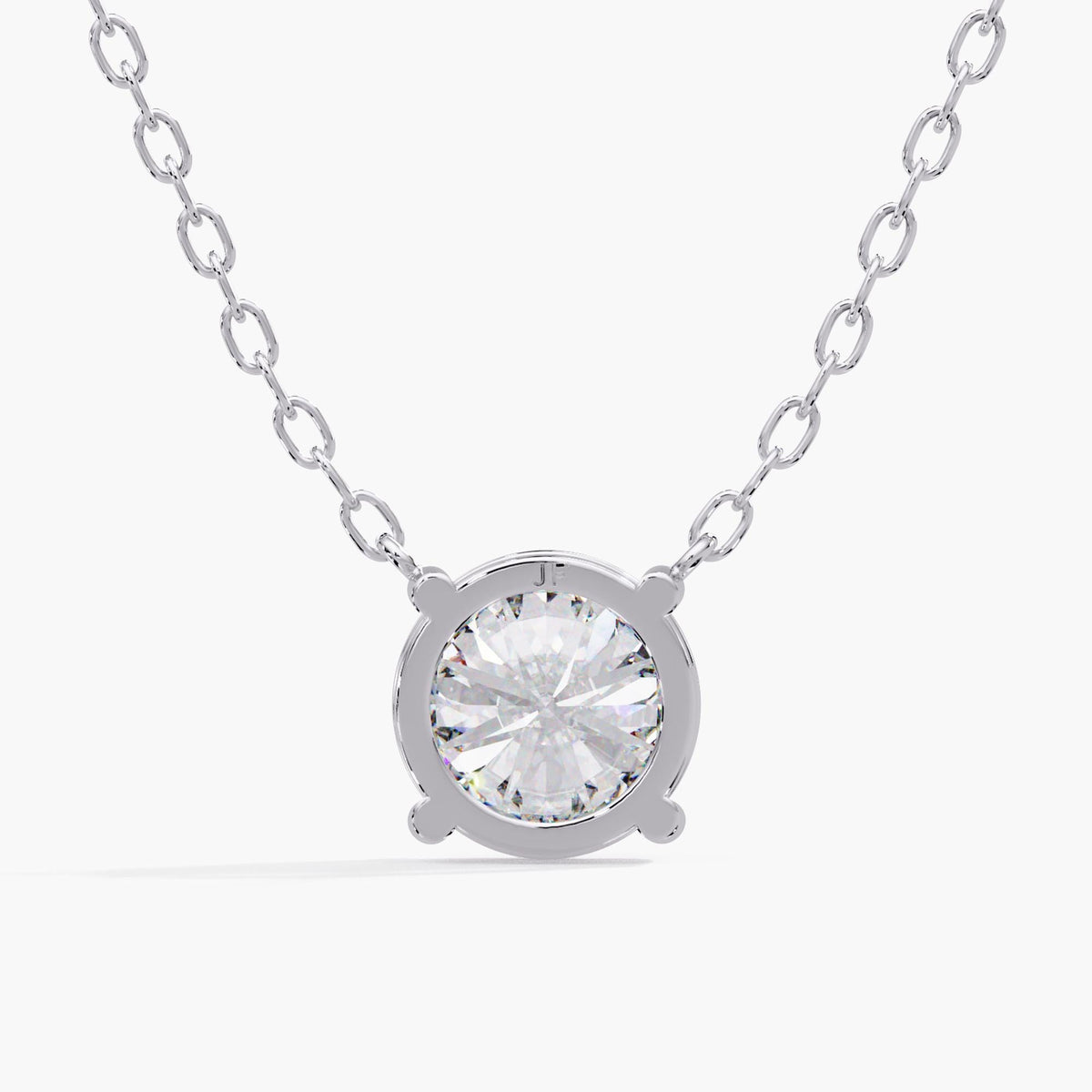 Round lab-grown diamond solitaire pendant necklace in 14K white gold, featuring a four-prong setting and delicate cable chain