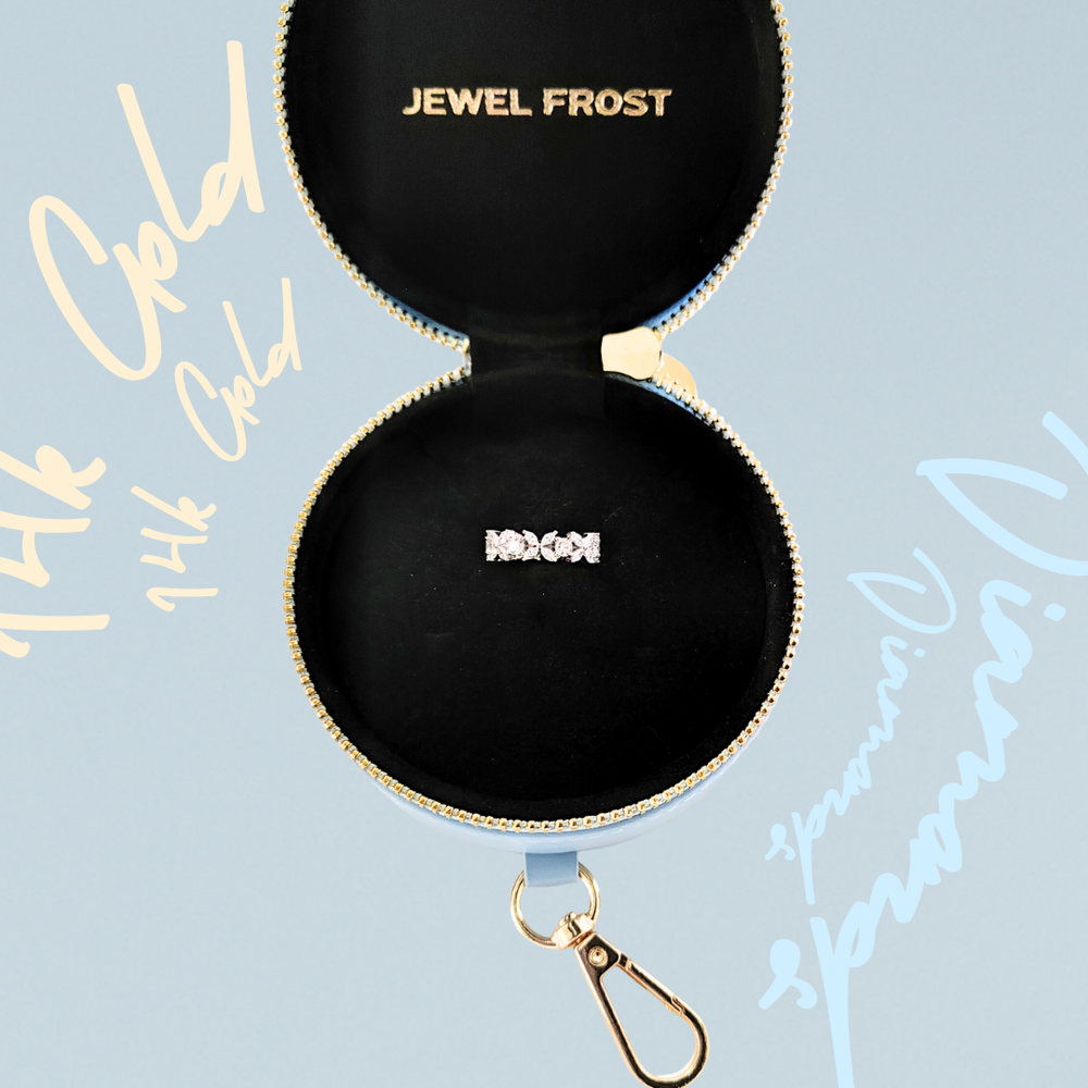 A diamond band inside Jewel Frost’s pale blue jewelry case.