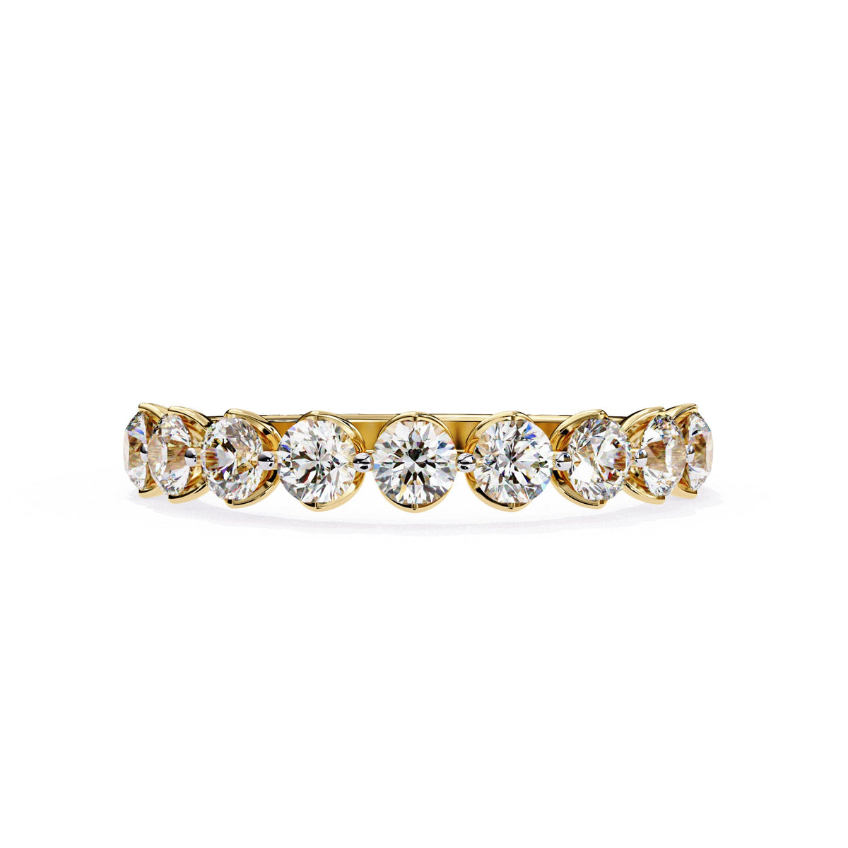 a gold ring with nine diamonds on it