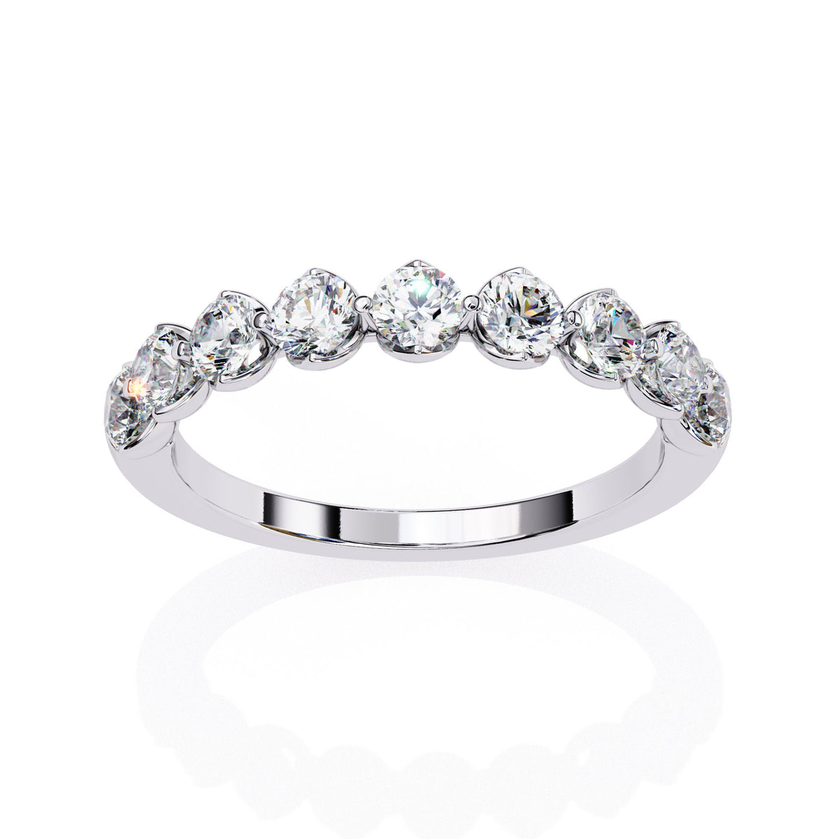 a gold ring with nine diamonds on it