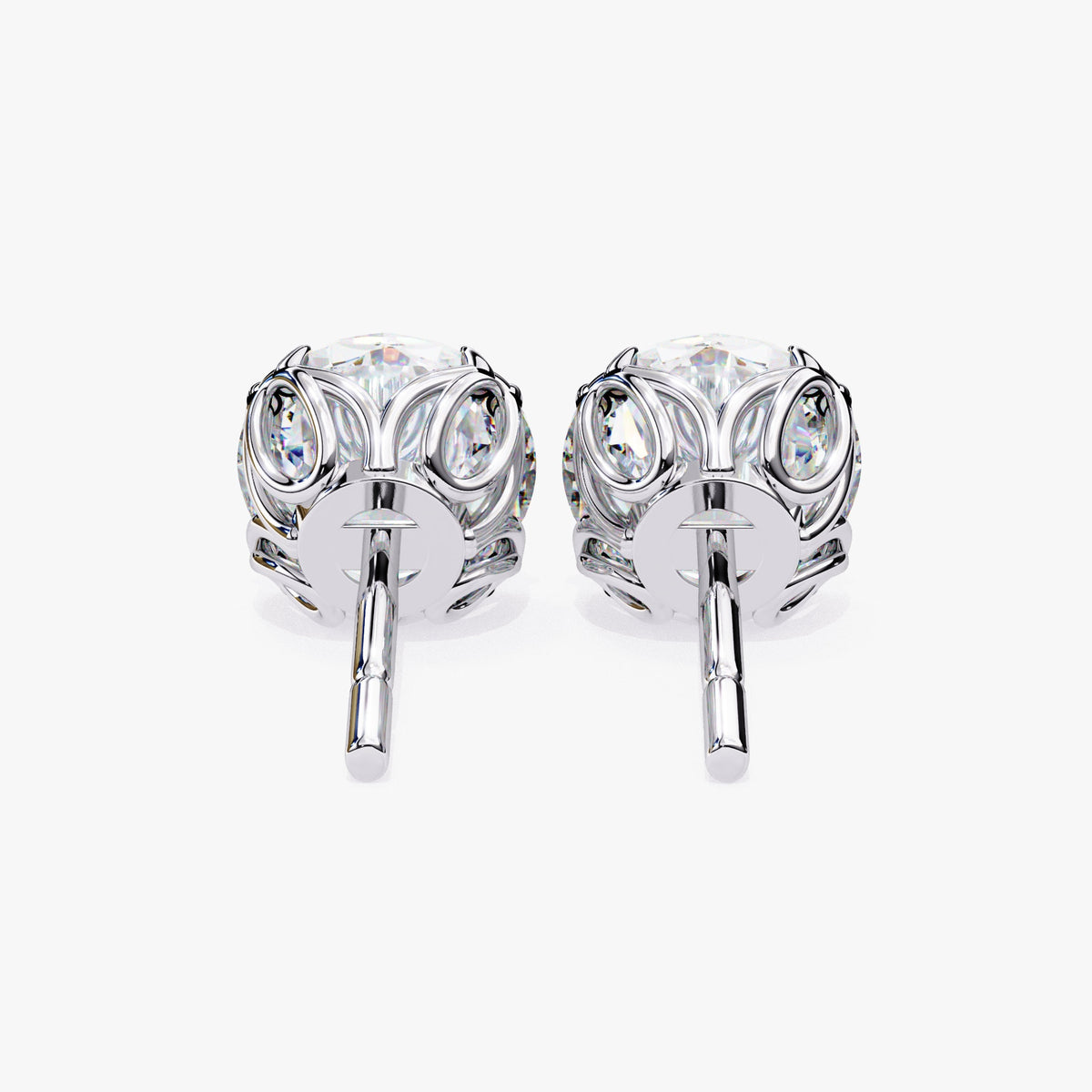 Back view of white gold round diamond earrings, showing the 8-prong and floral basked setting with straight posts.