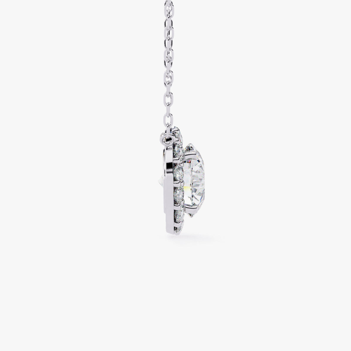 A white gold chain necklace with a round pendant featuring a single, clear, round-cut stone surrounded by a halo of smaller, clear stones.